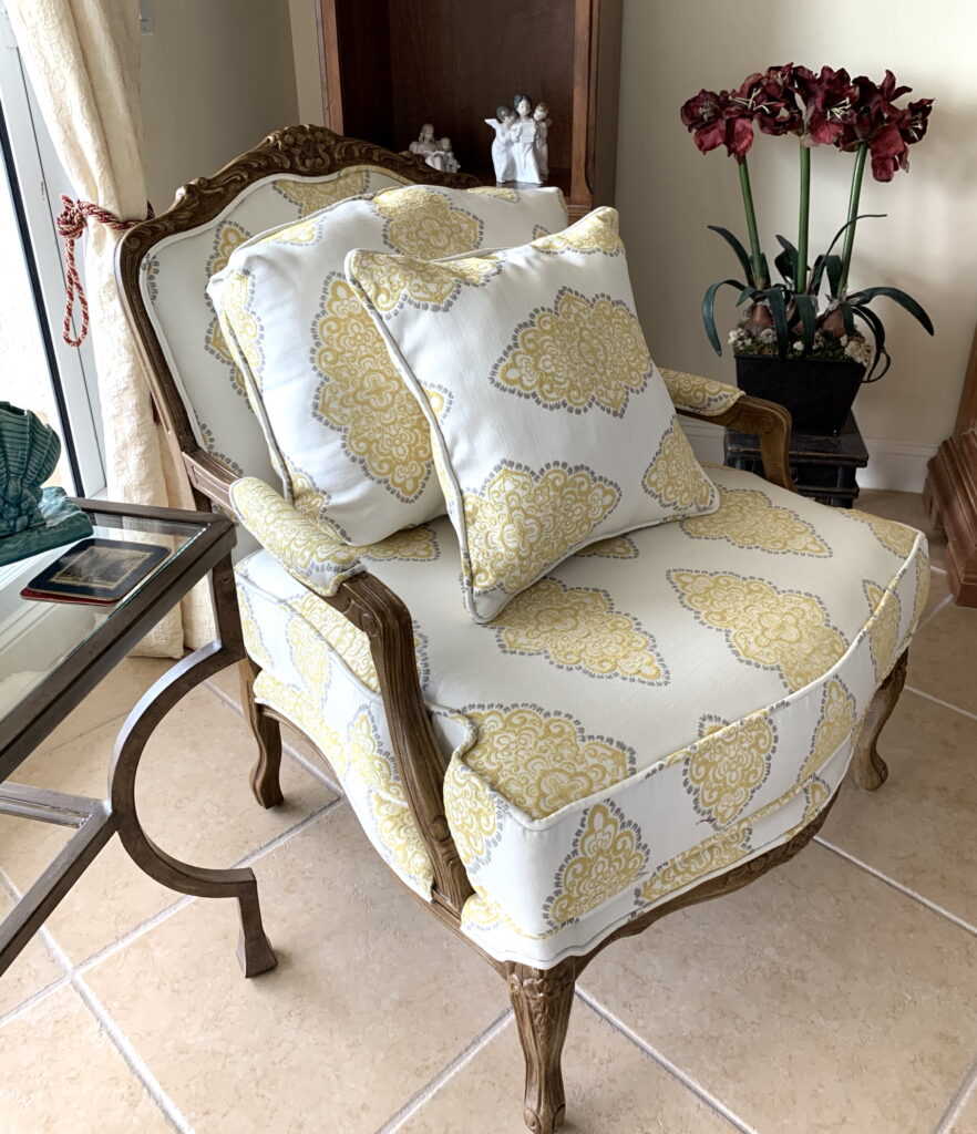 armchair with pillow upholstery